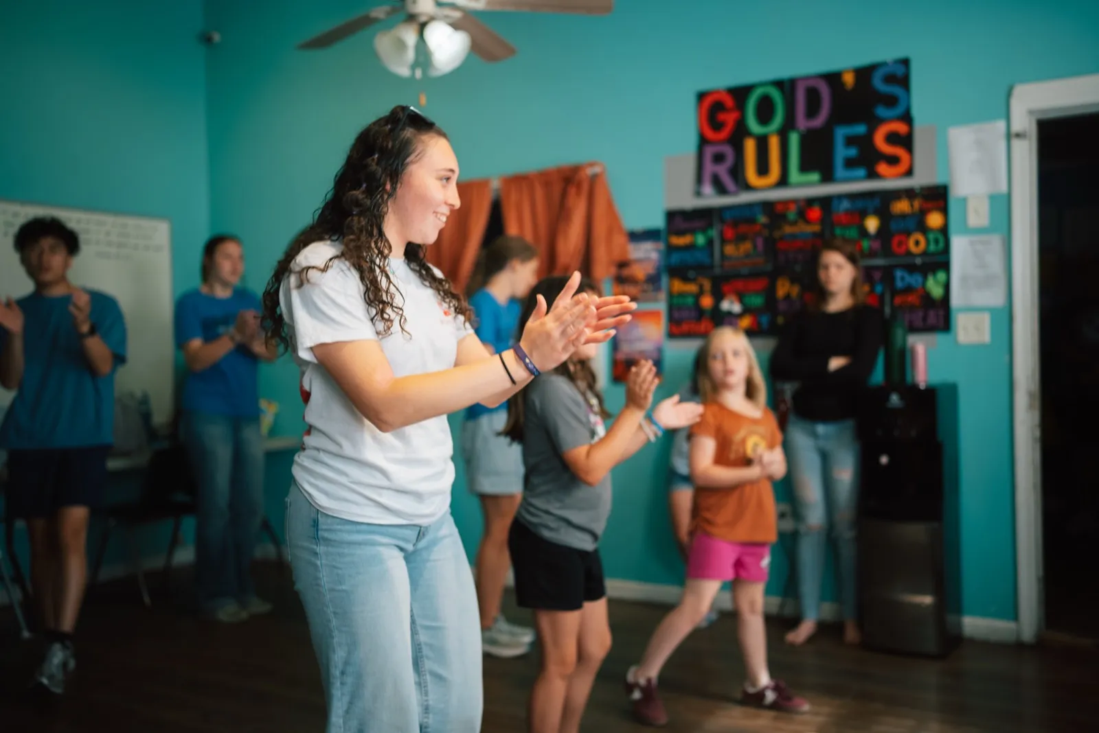 Students leading worship in a classroom